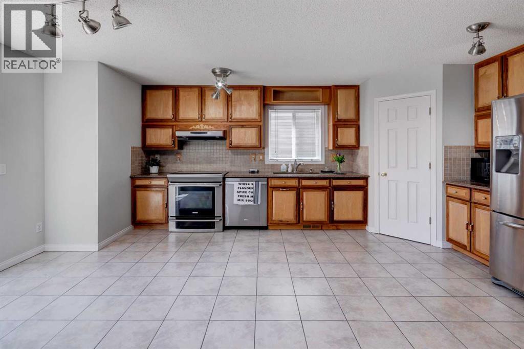 Photo 2 of 26 Rocky Ridge Heights Nw, Calgary AB