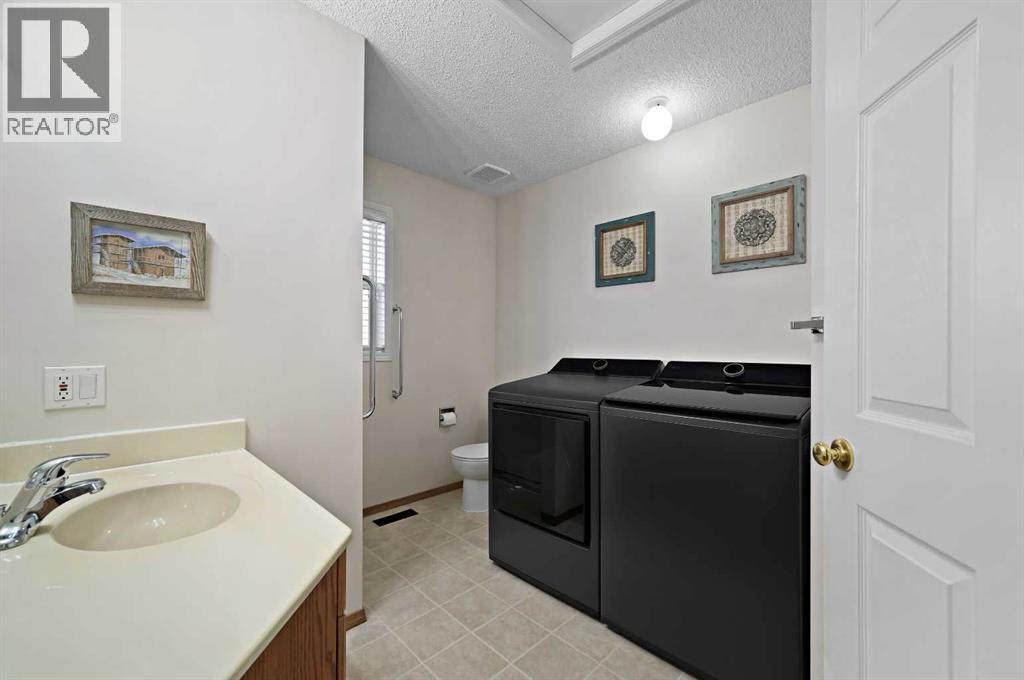 Single Family House Bungalow for Sale in  Mt Brewster Circle SE McKenzie Lake Calgary 