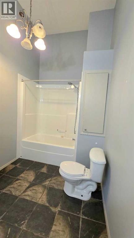 Photo 5 of 9857 66 Avenue, Grande Prairie AB