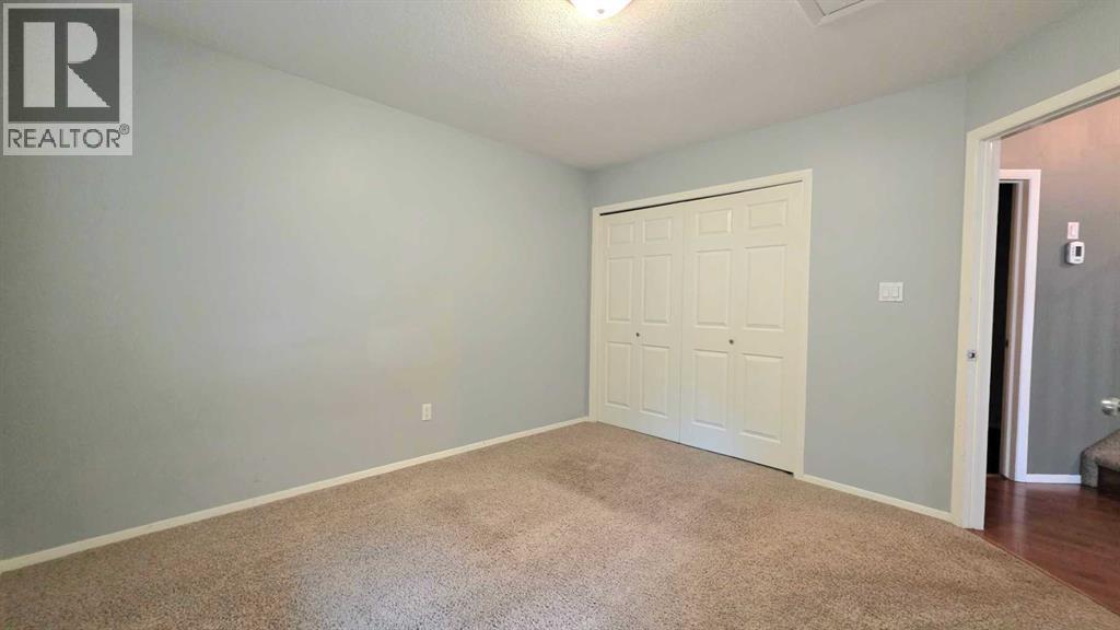 Photo 1 of 9857 66 Avenue, Grande Prairie AB