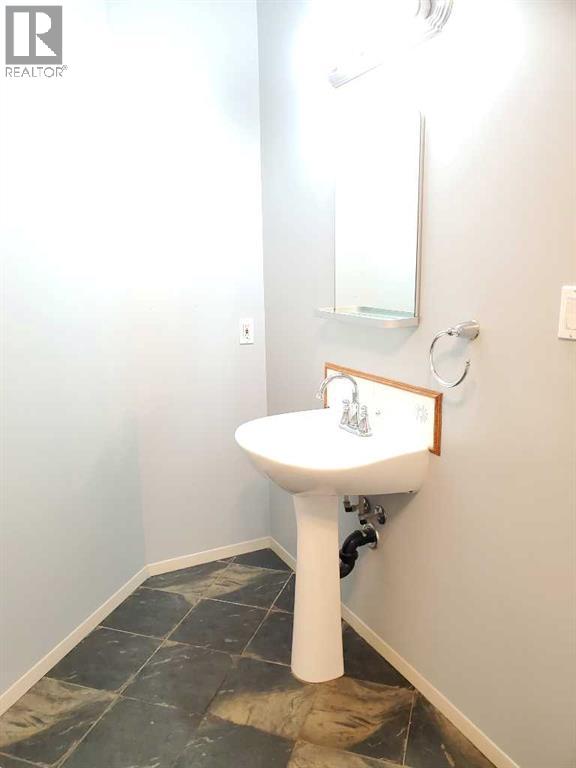 Photo 9 of 9857 66 Avenue, Grande Prairie AB