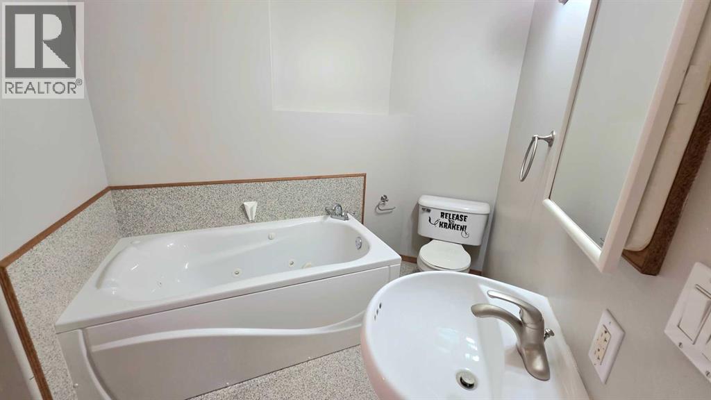 Photo 3 of 9857 66 Avenue, Grande Prairie AB