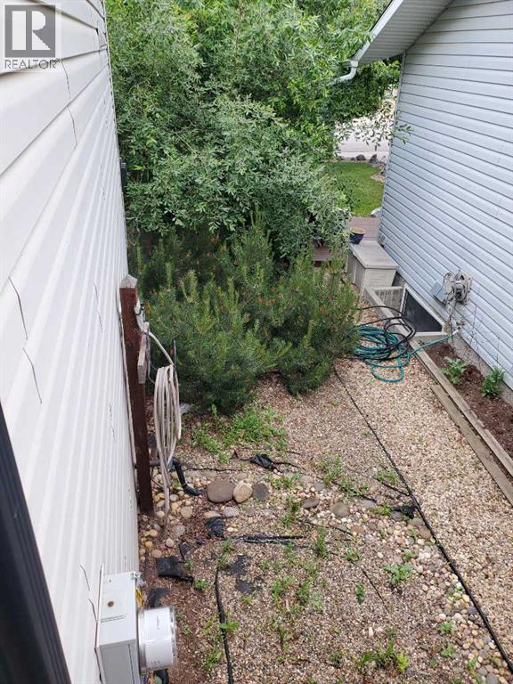 Photo 4 of 9857 66 Avenue, Grande Prairie AB