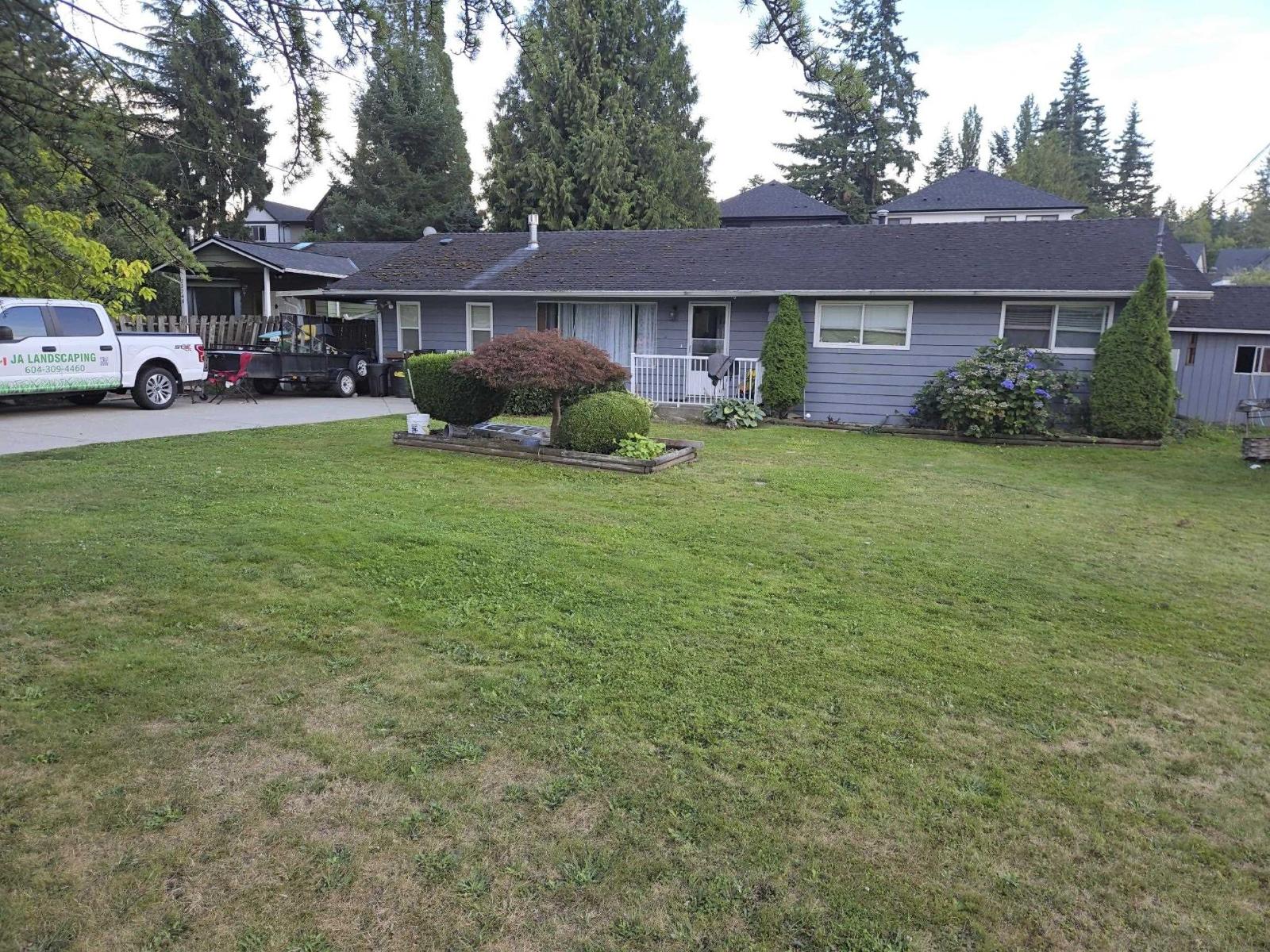 Photo 1 of 23740 Fraser Highway, Langley BC