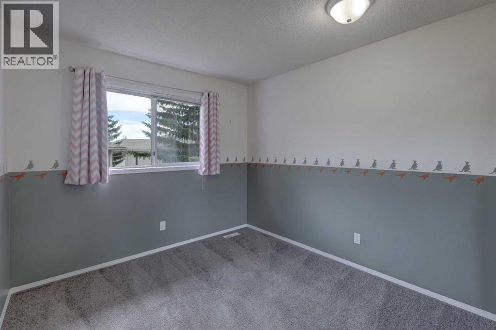 Single Family House for Sale in  Kingsland Villas SW Kingsland Calgary 