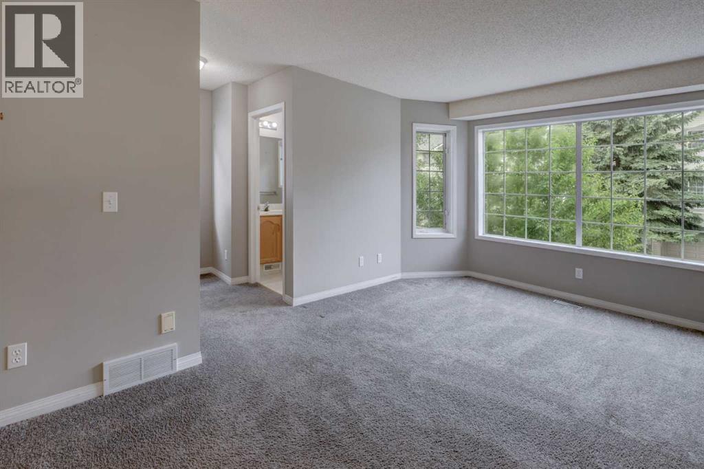 Single Family House for Sale in  Kingsland Villas SW Kingsland Calgary 