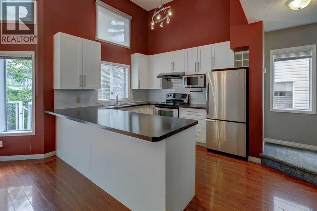 Single Family House for Sale in  Kingsland Villas SW Kingsland Calgary 
