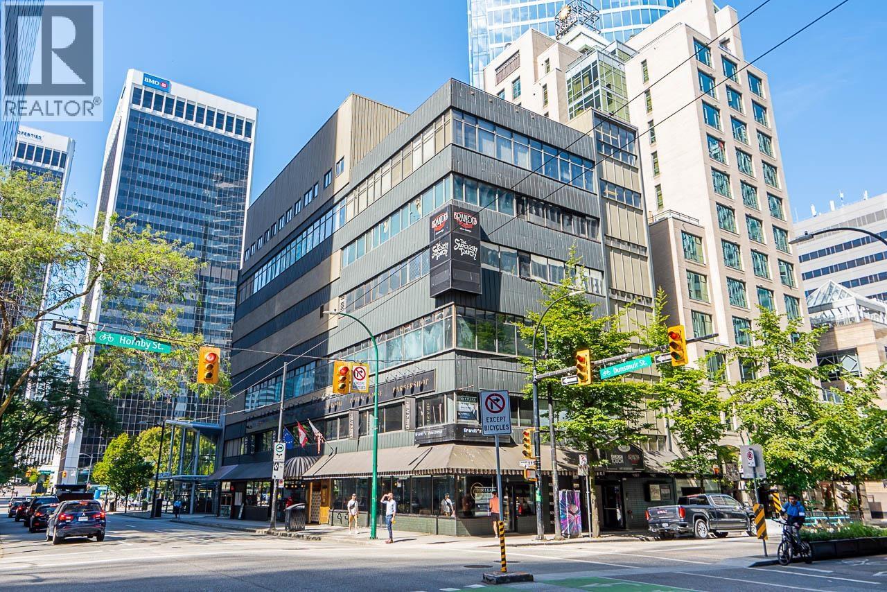 Photo 1 of Fl 1 2 595 Hornby Street, Vancouver BC