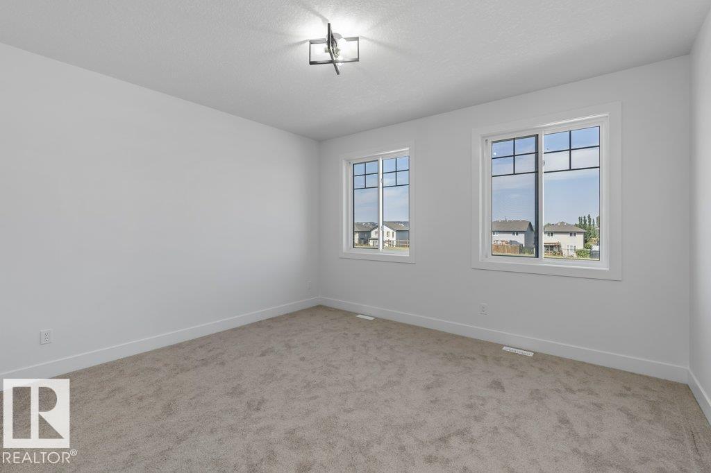 Photo 5 of 63 Silverstone Dr, Stony Plain AB
