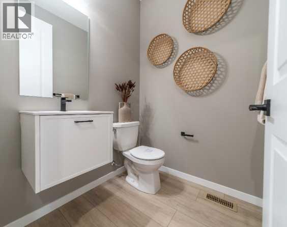 Single Family House for Sale in  Lucas Gardens NW Livingston Calgary 