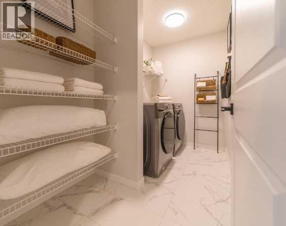 Single Family House for Sale in  Lucas Gardens NW Livingston Calgary 