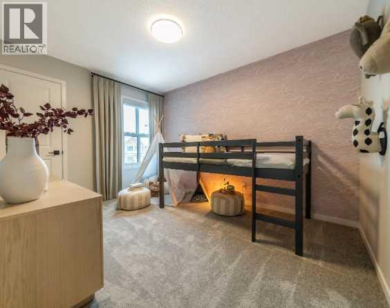 Single Family House for Sale in  Lucas Gardens NW Livingston Calgary 
