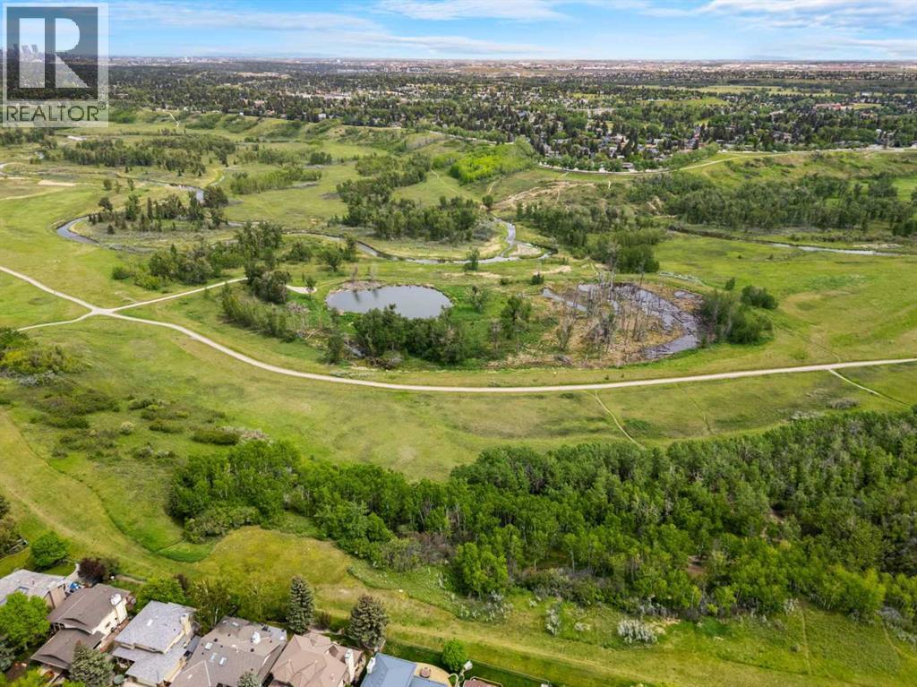 Single Family House 4 Level for Sale in  Sunvista Crescent SE Sundance Calgary 