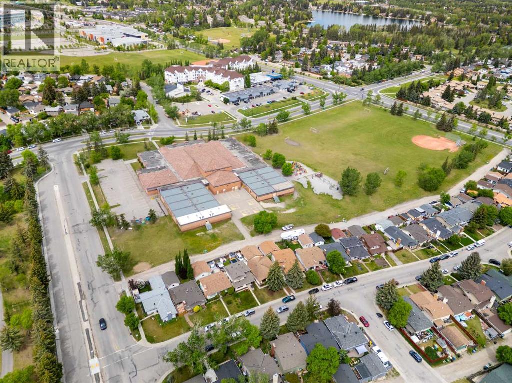 Single Family House 4 Level for Sale in  Sunvista Crescent SE Sundance Calgary 