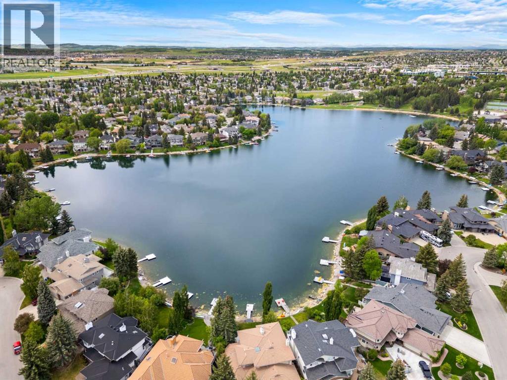 Single Family House 4 Level for Sale in  Sunvista Crescent SE Sundance Calgary 