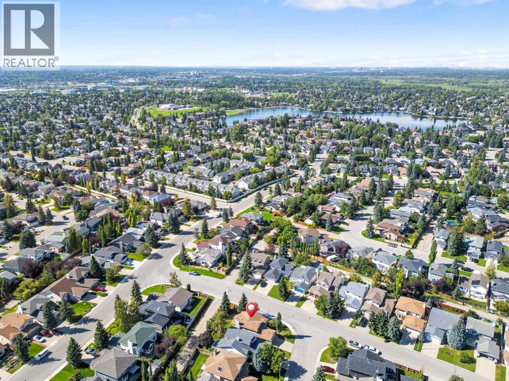 Single Family House 4 Level for Sale in  Sunvista Crescent SE Sundance Calgary 