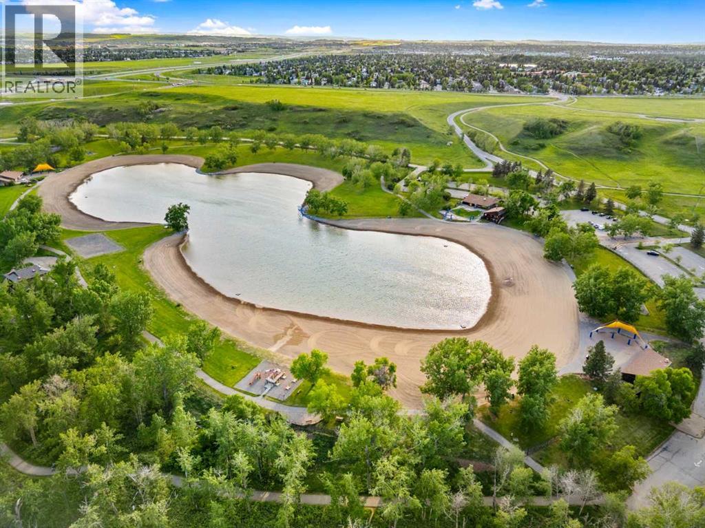 Single Family House 4 Level for Sale in  Sunvista Crescent SE Sundance Calgary 