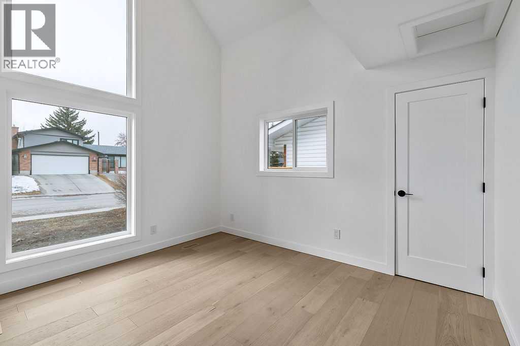 Single Family House for Sale in  Lake Twintree Road SE Lake Bonavista Calgary 