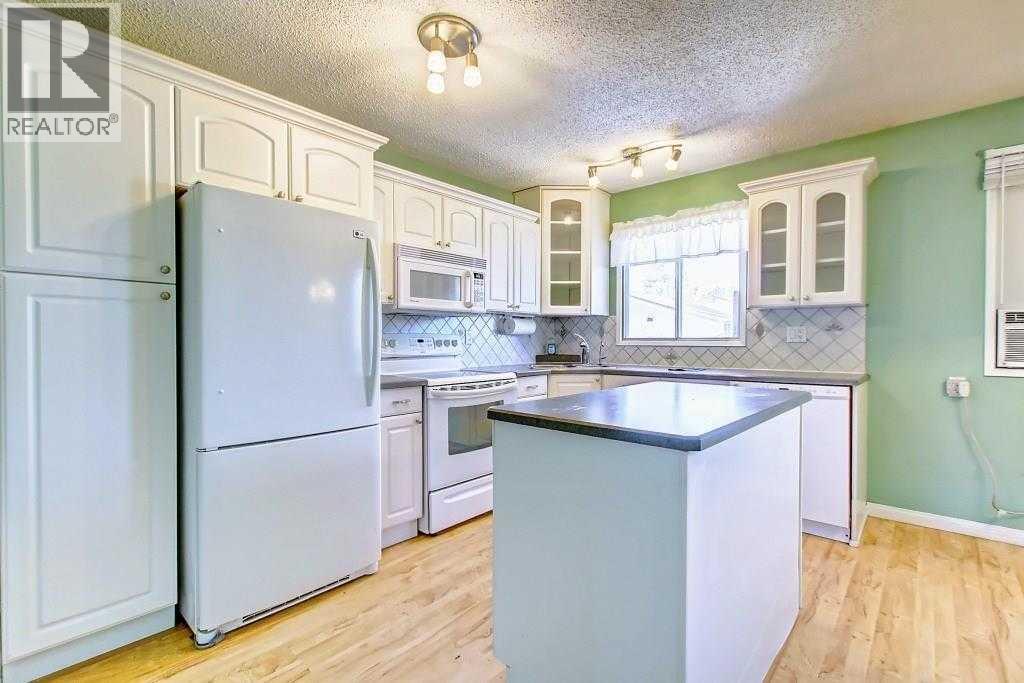 Single Family House Bungalow for Sale in  Rundlehorn Drive NE Pineridge Calgary 