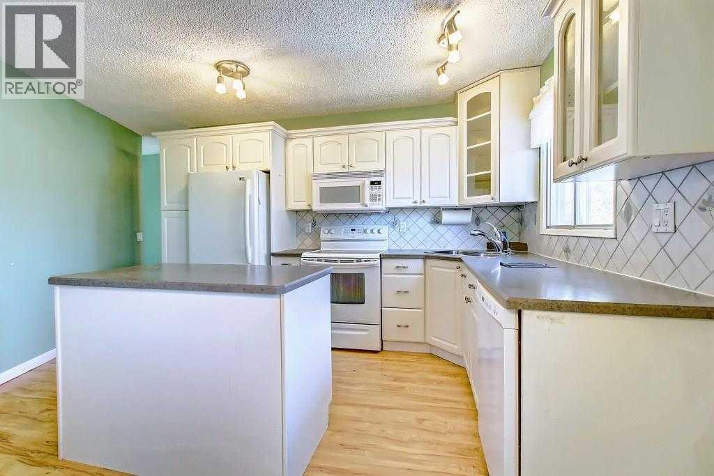 Single Family House Bungalow for Sale in  Rundlehorn Drive NE Pineridge Calgary 