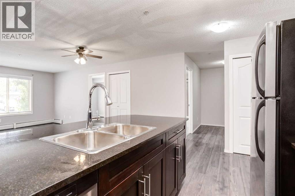 Photo 14 of 2108 403 Mackenzie Way Sw, Airdrie AB