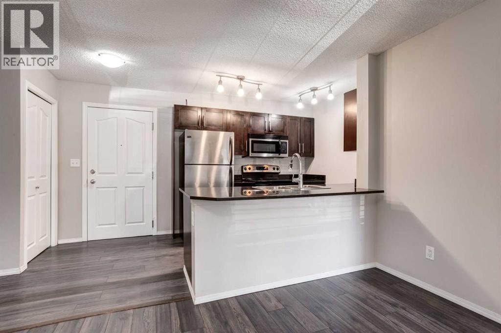 Photo 12 of 2108 403 Mackenzie Way Sw, Airdrie AB