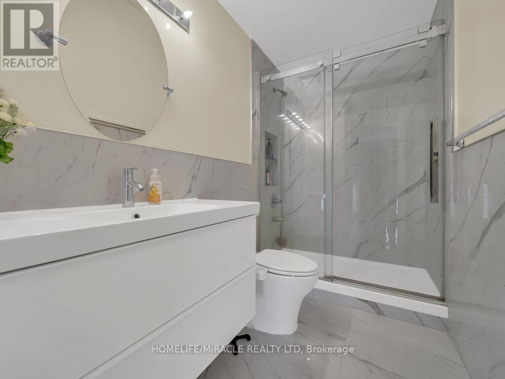 Photo 13 of 80 Sweetwood Circle, Brampton ON