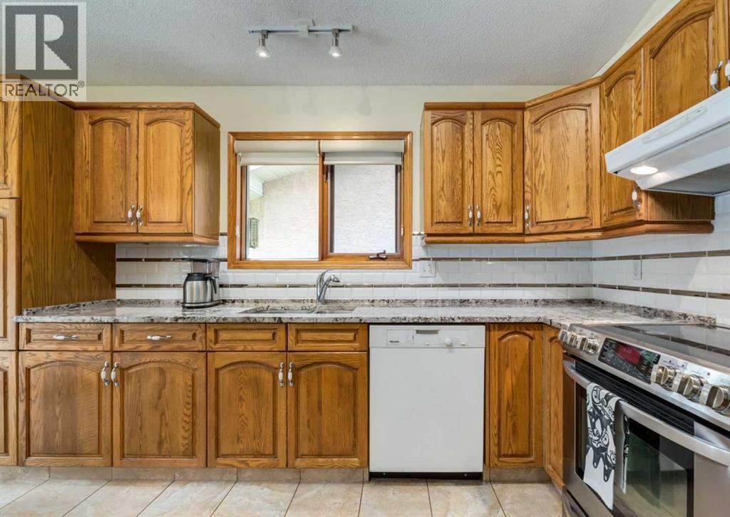 Single Family House Bungalow for Sale in  Hawkside Mews NW Hawkwood Calgary 