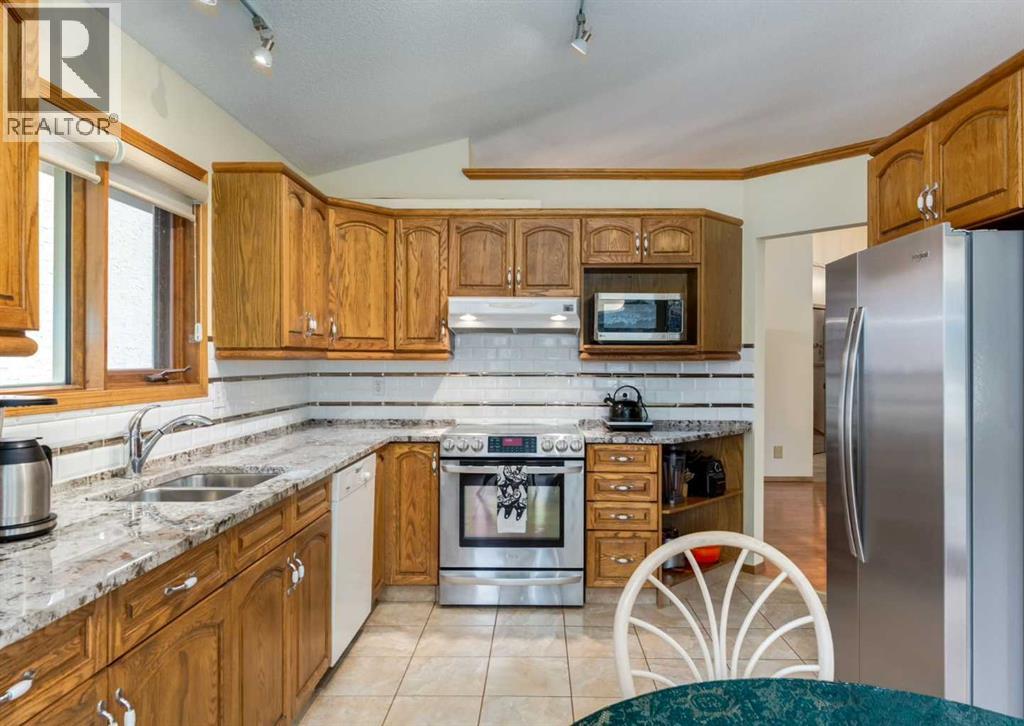 Single Family House Bungalow for Sale in  Hawkside Mews NW Hawkwood Calgary 