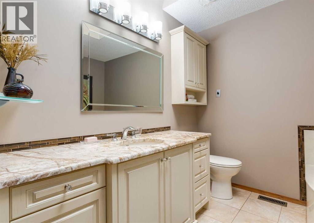 Single Family House Bungalow for Sale in  Hawkside Mews NW Hawkwood Calgary 