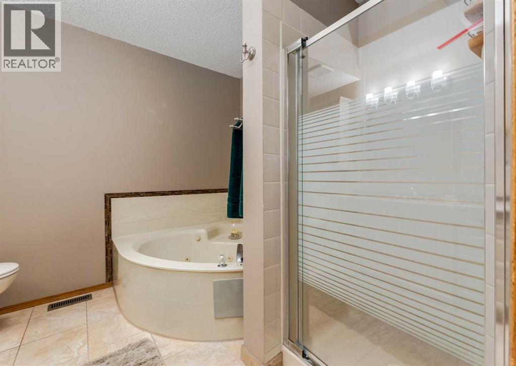 Single Family House Bungalow for Sale in  Hawkside Mews NW Hawkwood Calgary 
