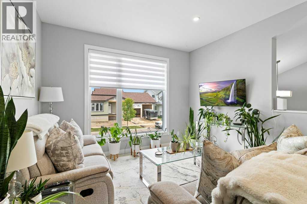 Single Family House Bi-level for Sale in  Ellington Crescent Evergreen Red Deer 