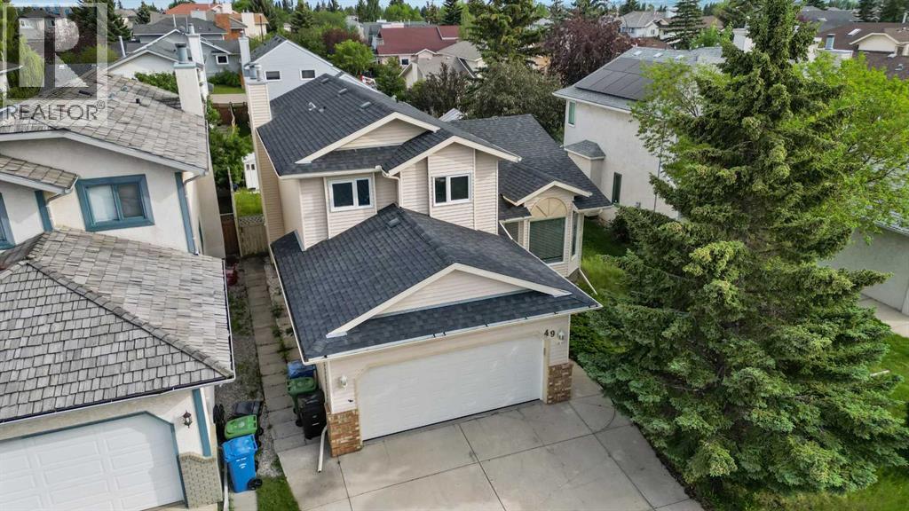 Single Family House for Sale in  Hawktree Circle NW Hawkwood Calgary 