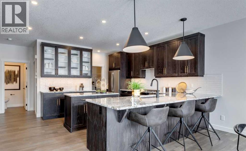 Photo 23 of 22 Wintergreen Bend, Okotoks AB