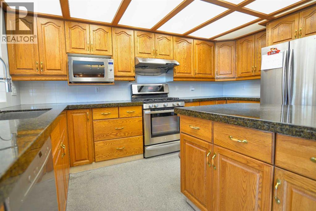 Single Family House for Sale in  Hawktree Circle NW Hawkwood Calgary 