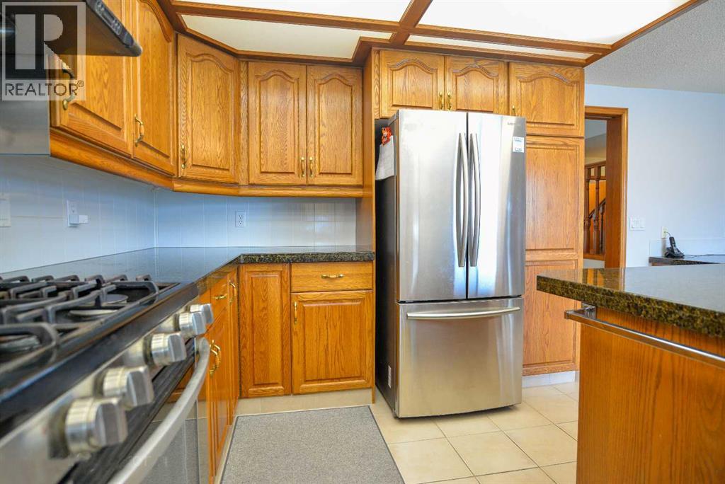 Single Family House for Sale in  Hawktree Circle NW Hawkwood Calgary 