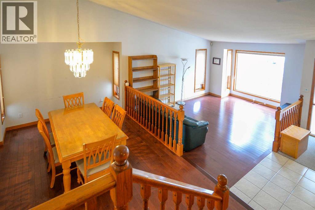 Single Family House for Sale in  Hawktree Circle NW Hawkwood Calgary 