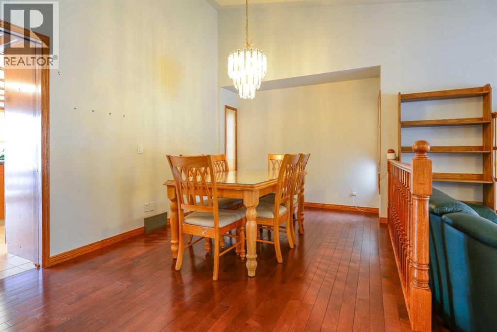 Single Family House for Sale in  Hawktree Circle NW Hawkwood Calgary 