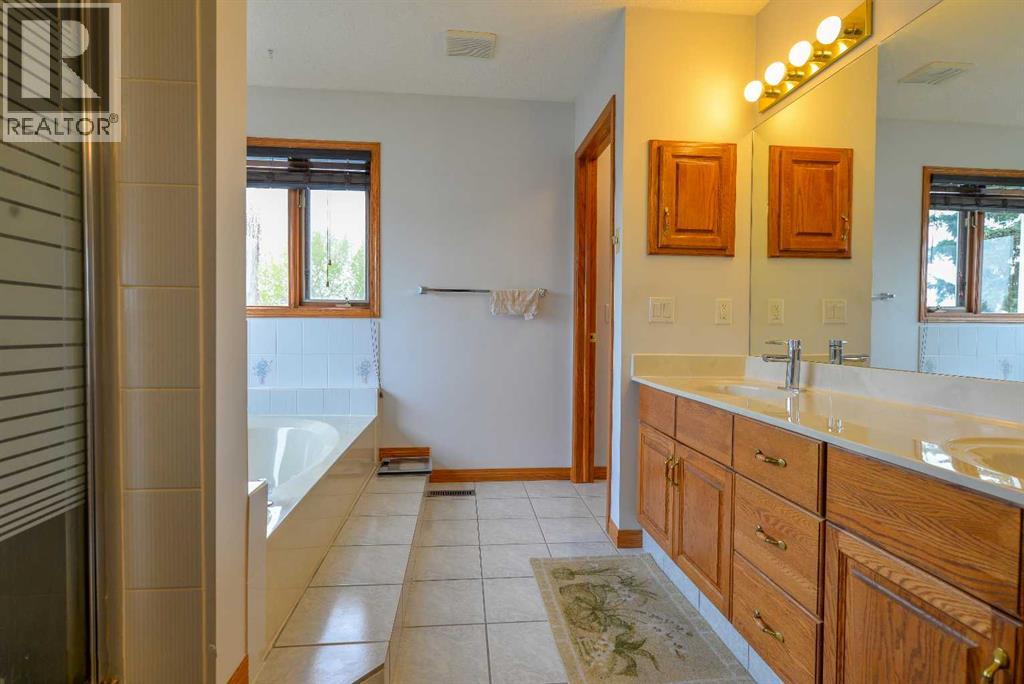 Single Family House for Sale in  Hawktree Circle NW Hawkwood Calgary 