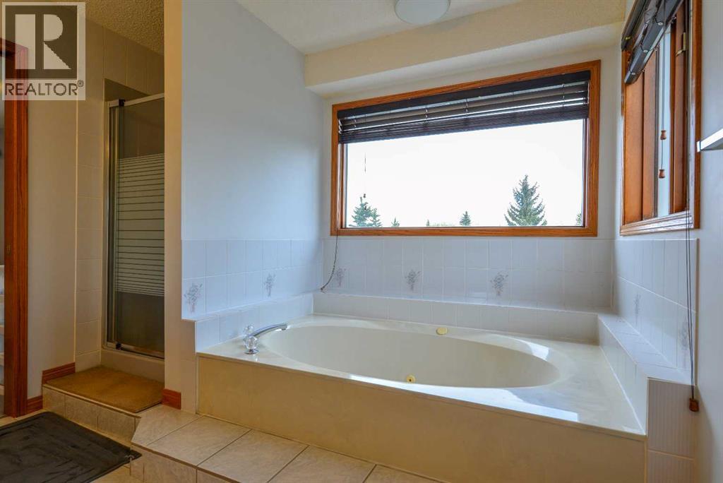 Single Family House for Sale in  Hawktree Circle NW Hawkwood Calgary 
