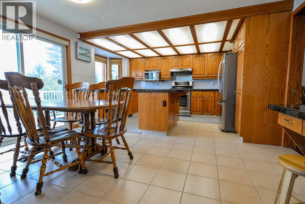 Single Family House for Sale in  Hawktree Circle NW Hawkwood Calgary 