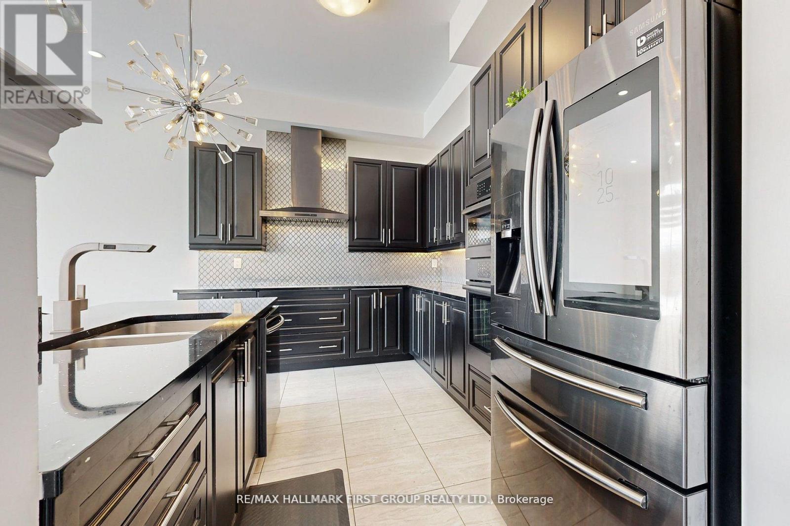 Photo 13 of 329 Windfields Farm Drive W, Oshawa ON