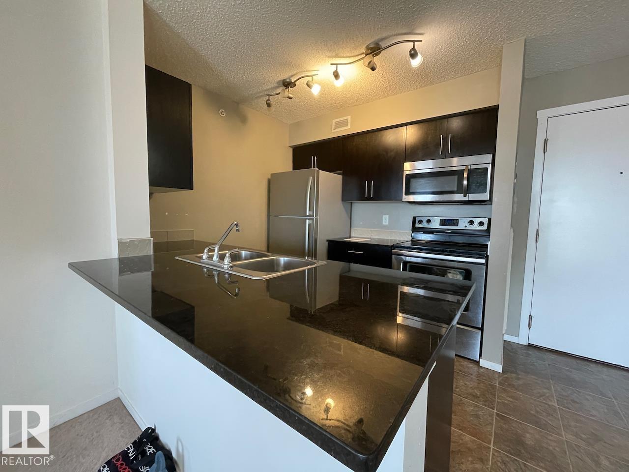 Photo 10 of 403 5810 Mullen Pl Nw, Edmonton AB
