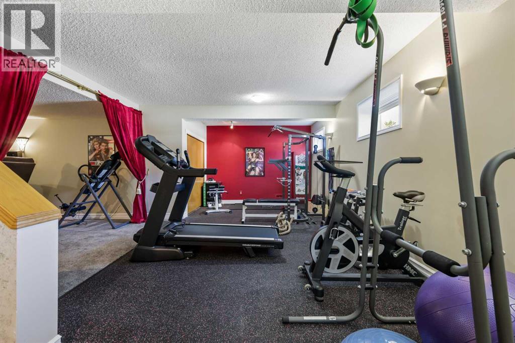 Single Family House for Sale in  Hawktree Bay NW Hawkwood Calgary 