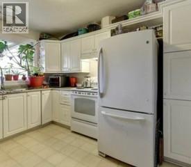 Photo 27 of 1506 Dickson Avenue, Kelowna BC