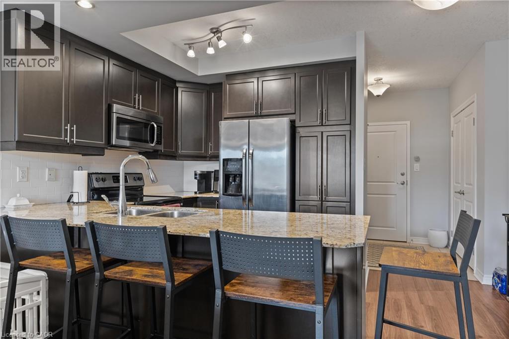 Photo 5 of 539 Belmont Avenue W Unit 210, Kitchener ON
