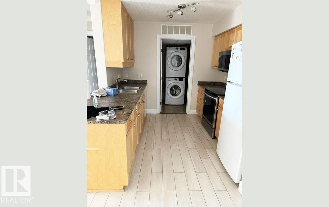 Photo 13 of 418 13111 140 Av Nw, Edmonton AB