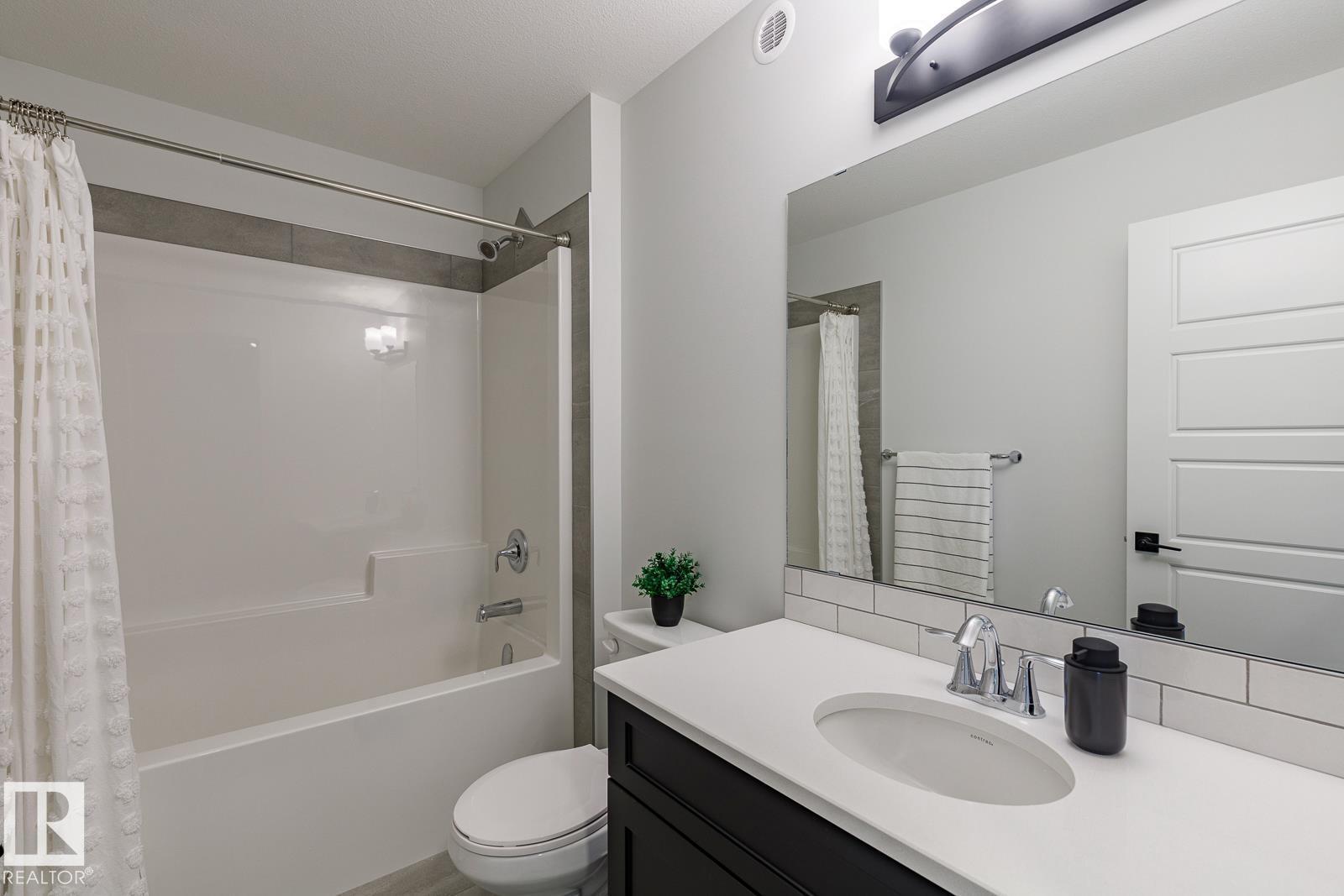 Photo 10 of 82 Silverstone Dr, Stony Plain AB