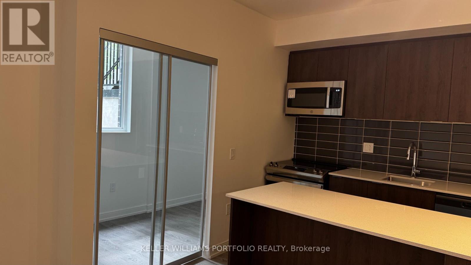 Photo 8 of 20 172 Clonmore Drive, Toronto ON
