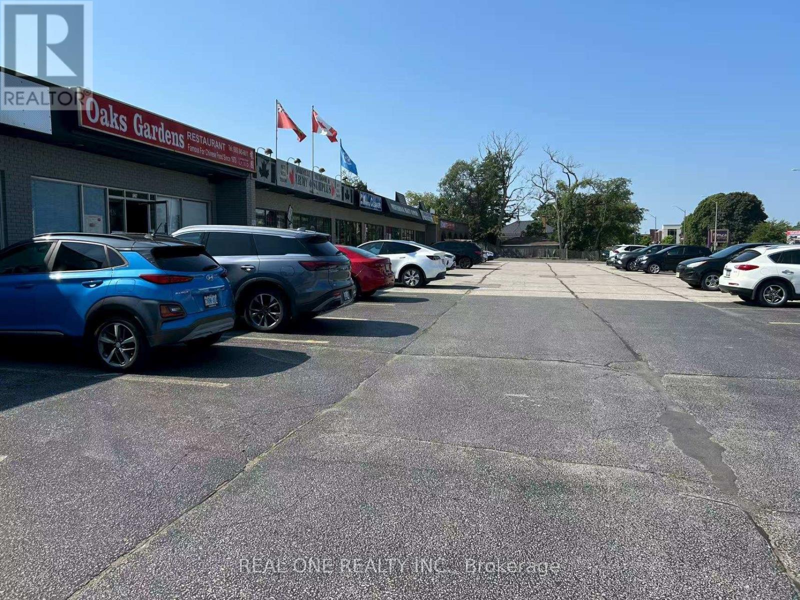 Photo 2 of 128 Speers Road, Oakville ON
